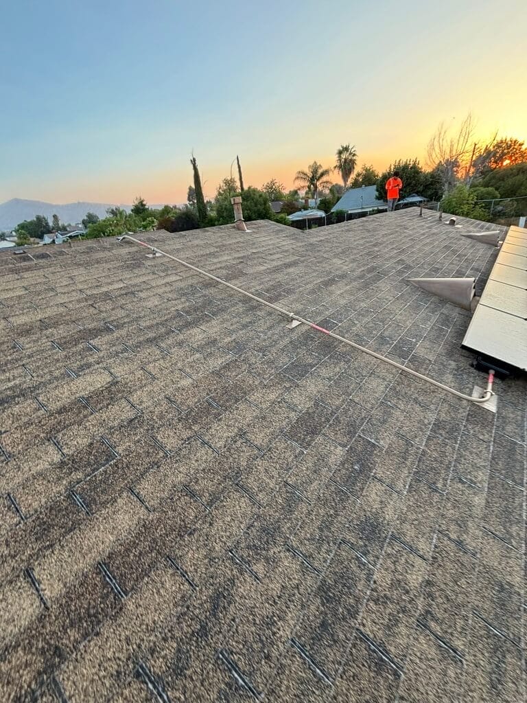rooftop conduit with solar panels, licensed roof installers