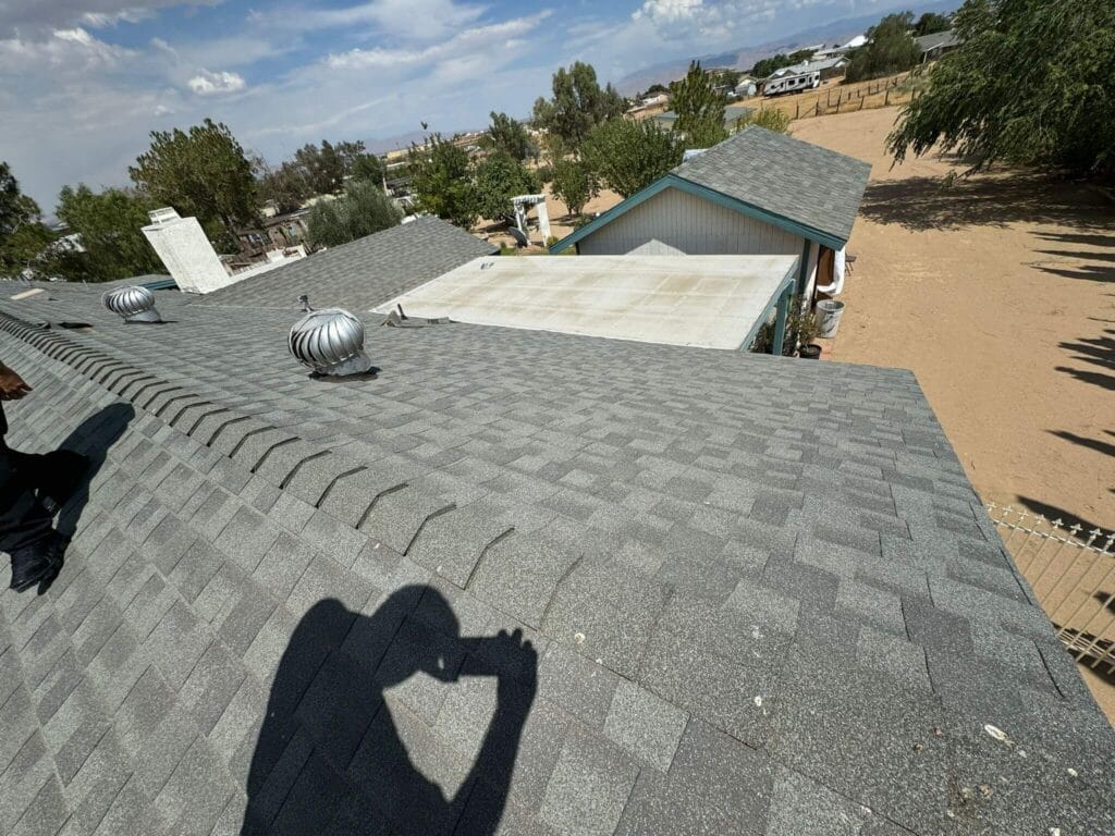 gray roof tiles just installed, roofing repair companies near me